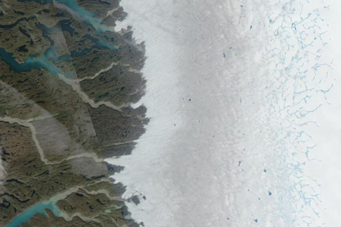Satellite image of Greenland Ice Sheet showing melt lakes and streams