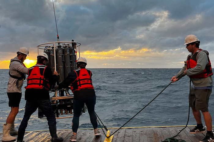 Scientists on ship deck