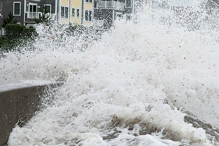 Spray of ocean water near sea wall