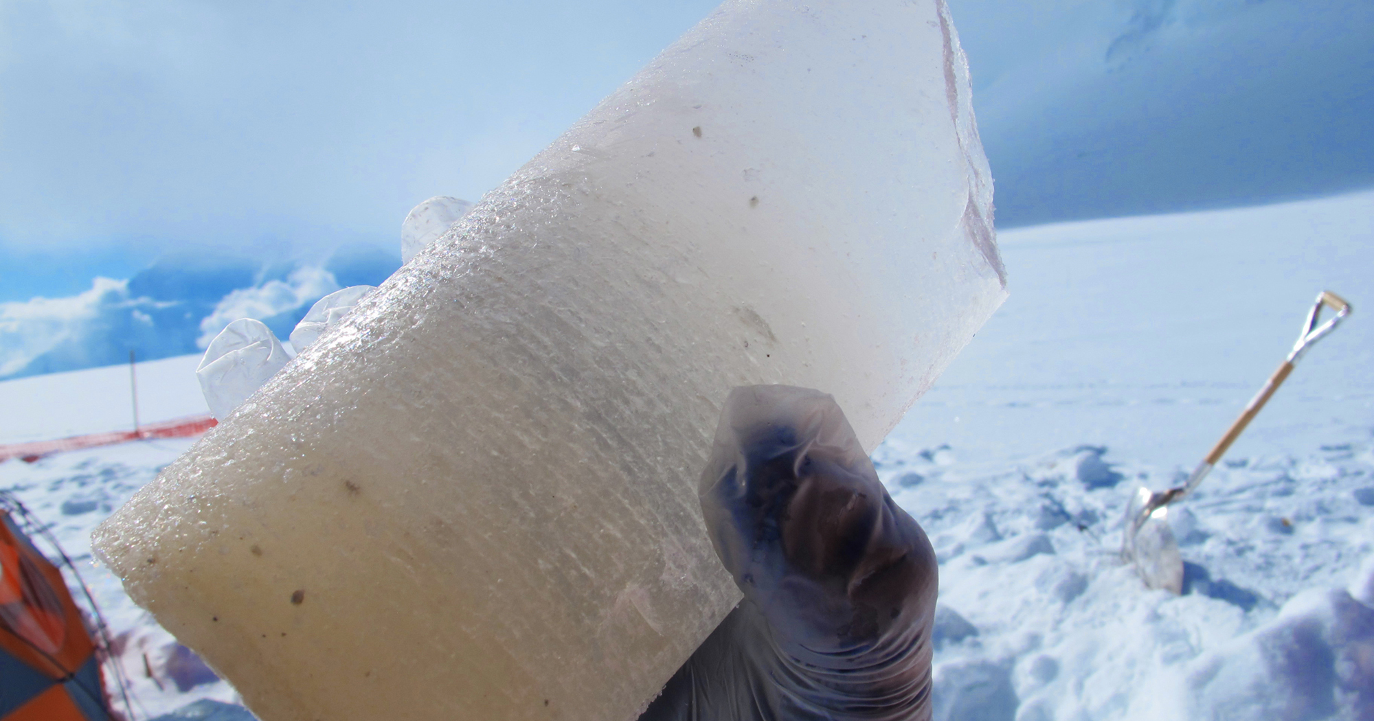 photo of a chunk of ice core being held after extraction in Alaska for social media sharing