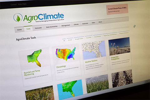 View of a computer screen showing the AgroClimate website