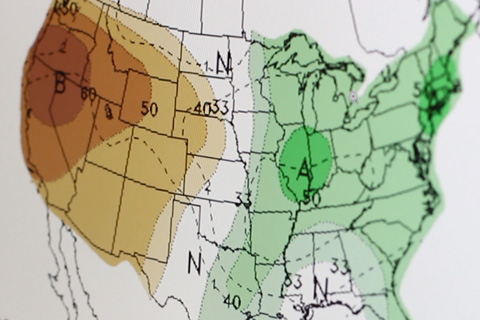 View of a computer screen showing a U.S. precipitation outlook map