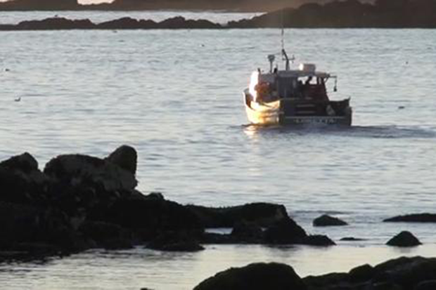 A lobster boat out on the water