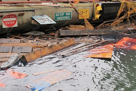 photo of flooding beneath subway overpass in New York City following Sandy