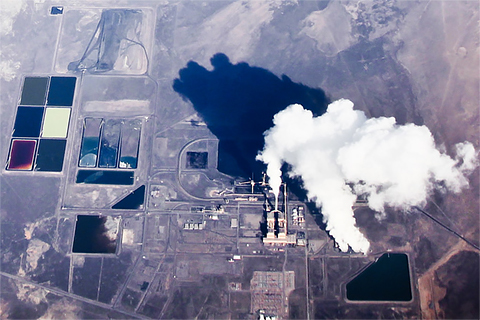 Photo of steam billowing from a power plant in Utah