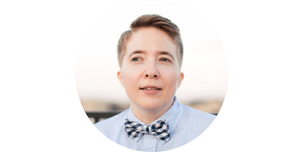photo of a person with short hair wearing a bowtie